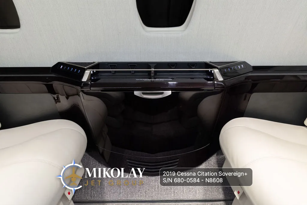 2019 Cessna Citation Sovereign+ S/N 680-0584 - interior photos of an aircraft for sale, Mikolay Jet group logo