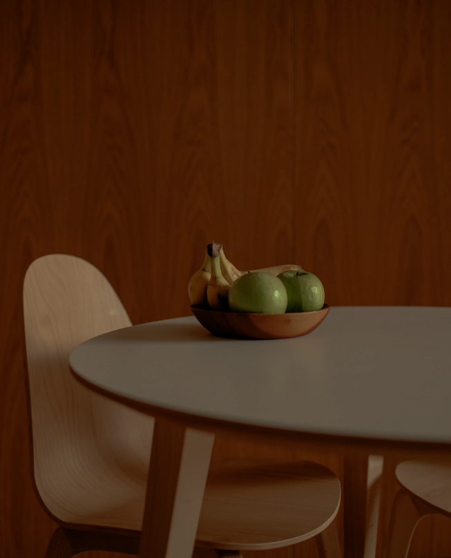 Modern computer on a sleek table with a fresh apple at our Montreal web design agency, where creativity meets cutting-edge technology to build innovative websites for local businesses.