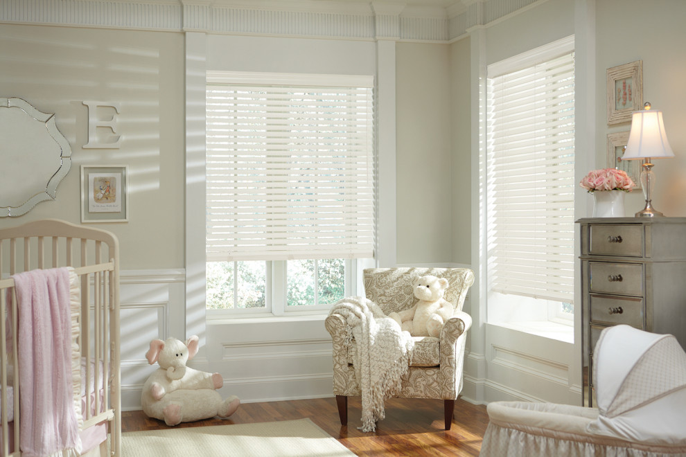 White window blinds brighten a peaceful nursery in University Park, TX