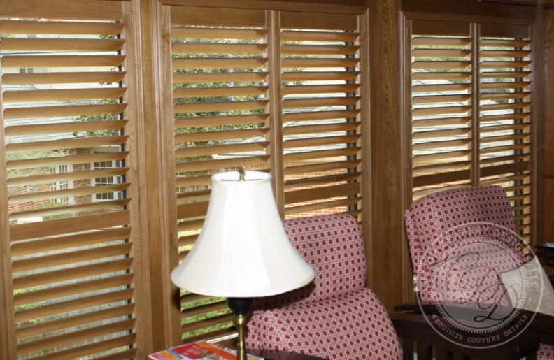 Wood window shutters with adjustable louvers in University Park, TX