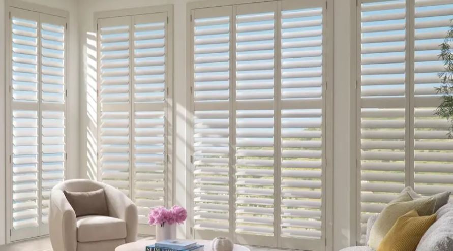 White window shutters in a bright Lakewood, TX living room