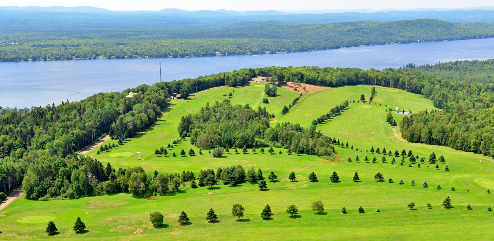 Portage, Maine features Portage Hills Country Club for a day of golf.
