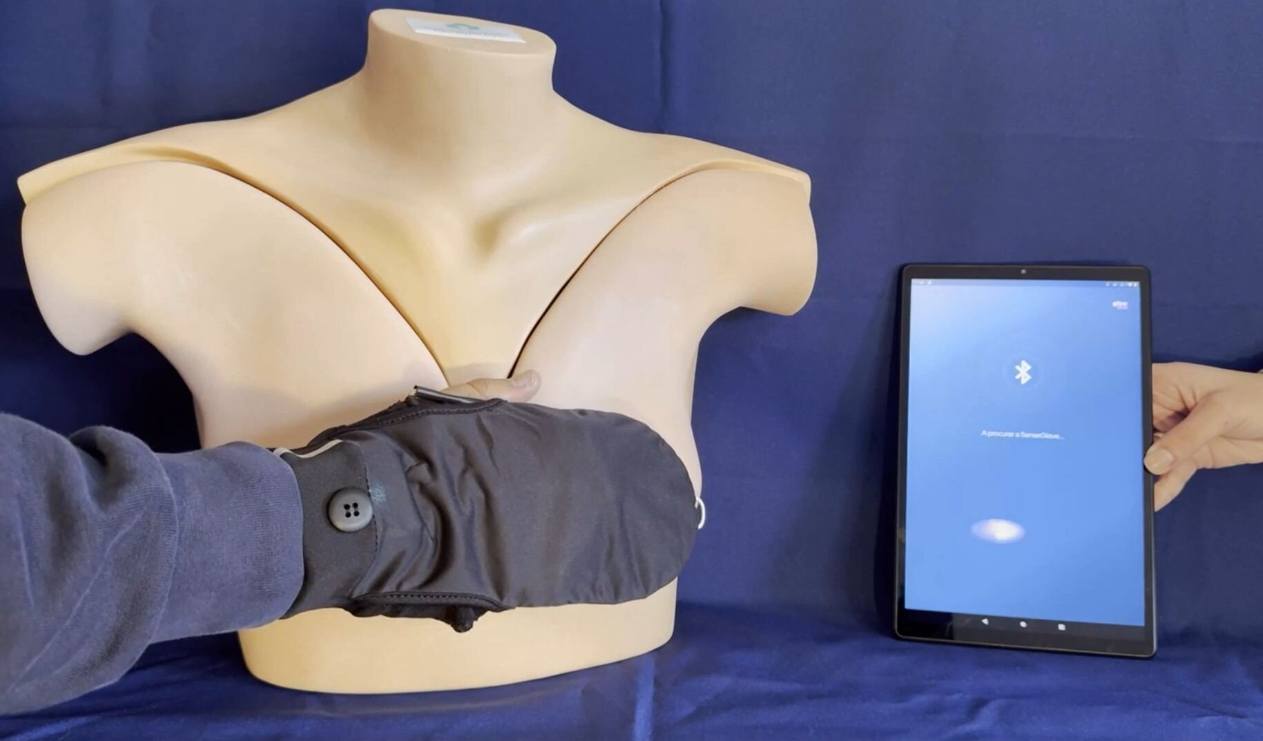 SenseGlove demonstrated on a training model with its companion app