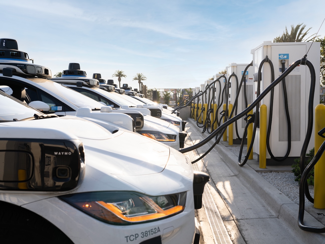 Robotaxis charging at a Terawatt charging site in Los Angeles, CA.