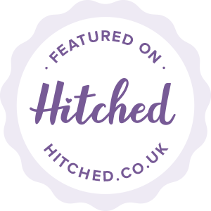 A decorative circular logo bade for hitched uk, a wedding venue supplier site that cat the celebrant is featured on. 