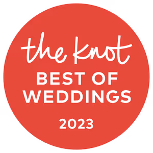 The Knot Best of Weddings 2023 badge in white text on a red circular background.