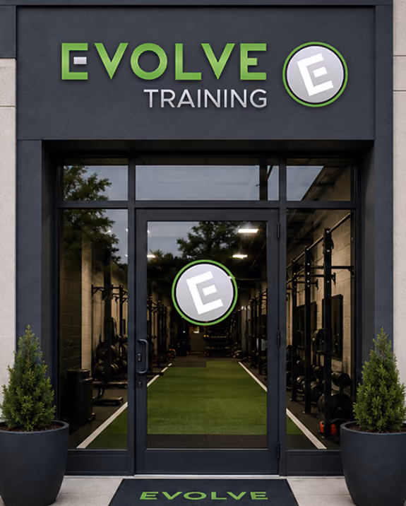 Evolve Training NJ storefront entrance, gym visible through glass doors