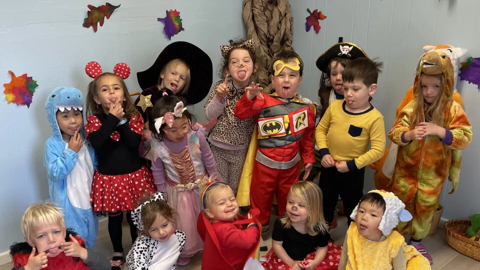 Children exploring hands-on materials at Nitty Gritty Preschool