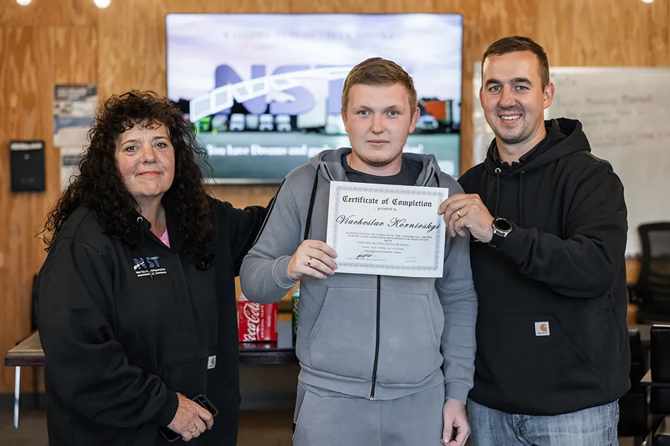 New Sound CDL School employee helping a student with financing options.