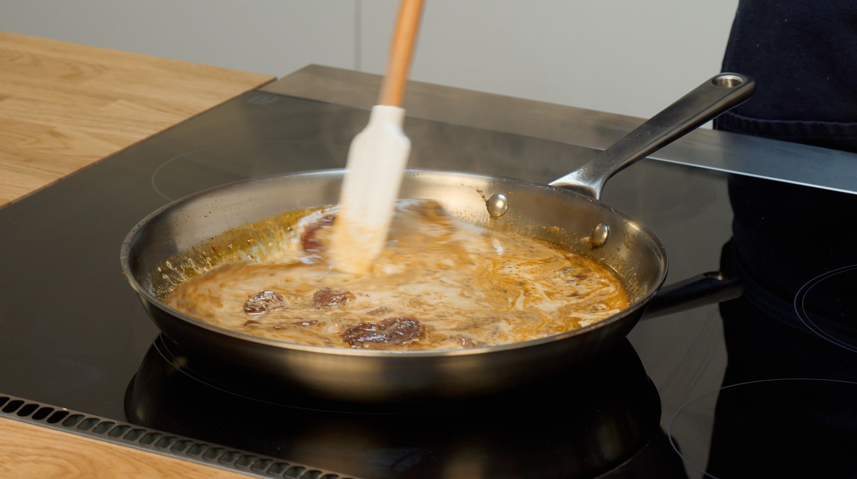 Cooking chicken on The Electra Induction Stove