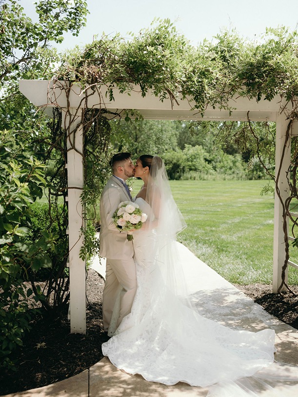 the bride and groom at their mustard seed gardens wedding