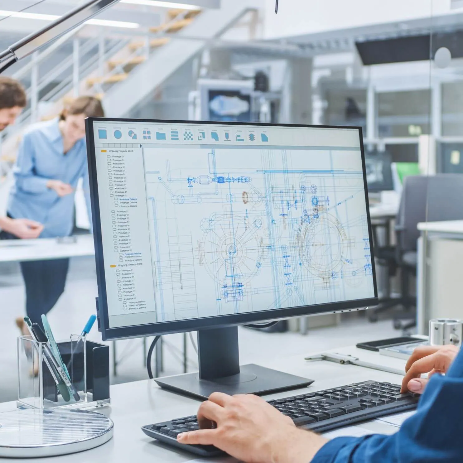 An engineer working on an engineering design. 