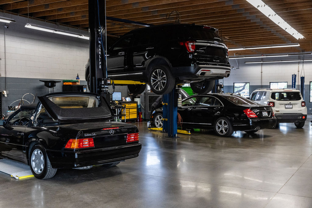 Multiple family vehicles being serviced at Car Life Auto Care