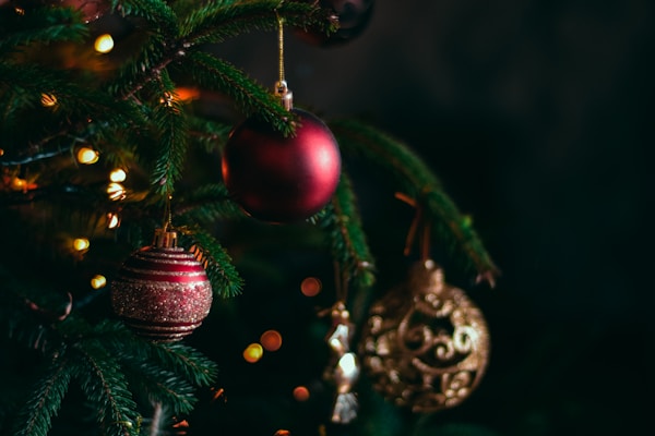 Multiple Car Life Technicians Servicing a Vehicle