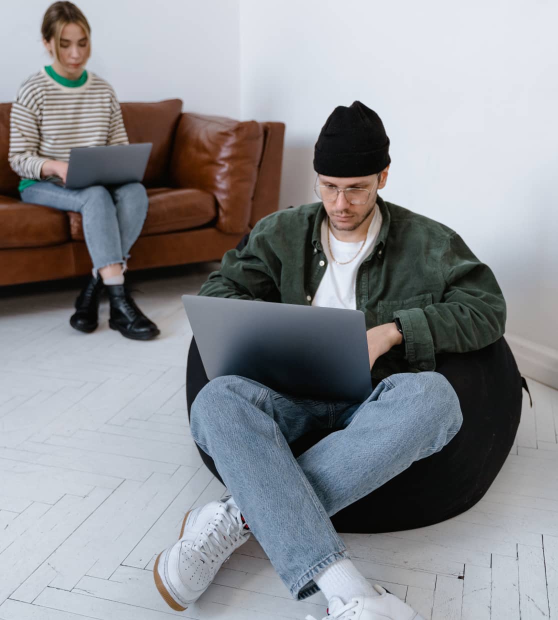 Image of team members working on their computers