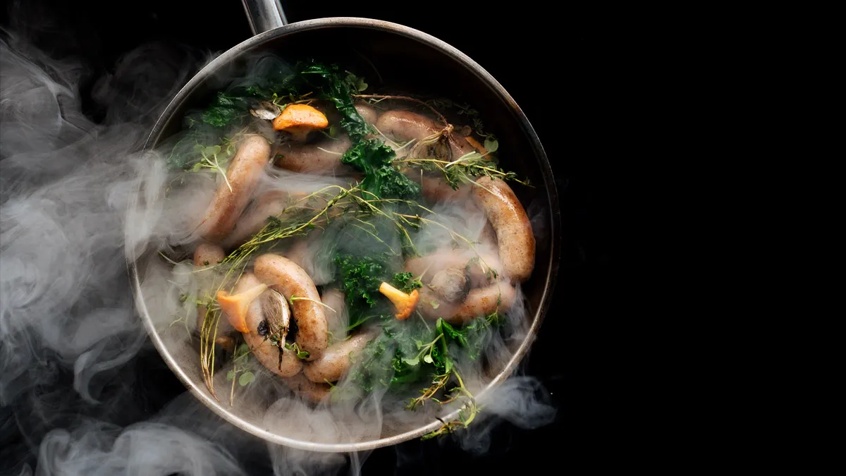 Lightly smoked pork sausages, chanterelle and cabbage