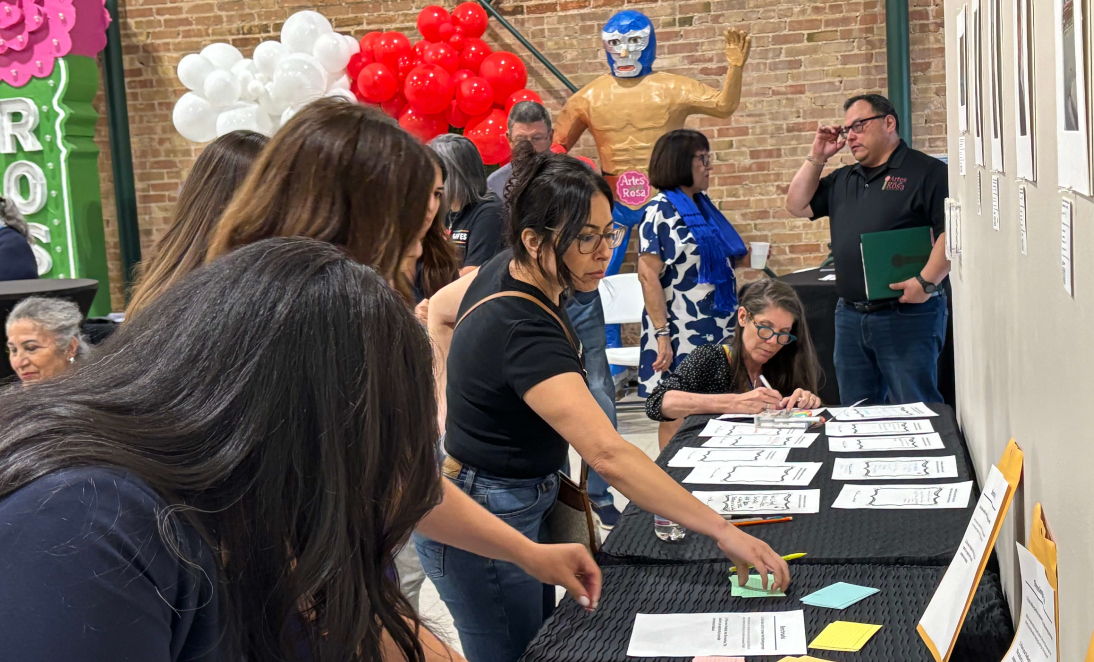 Image of people at an informational table
