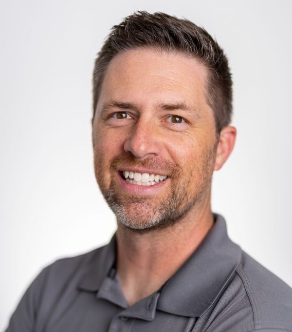 Smiling head shot of dr hansen