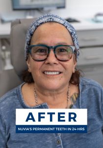 Woman smiling after getting dental implants