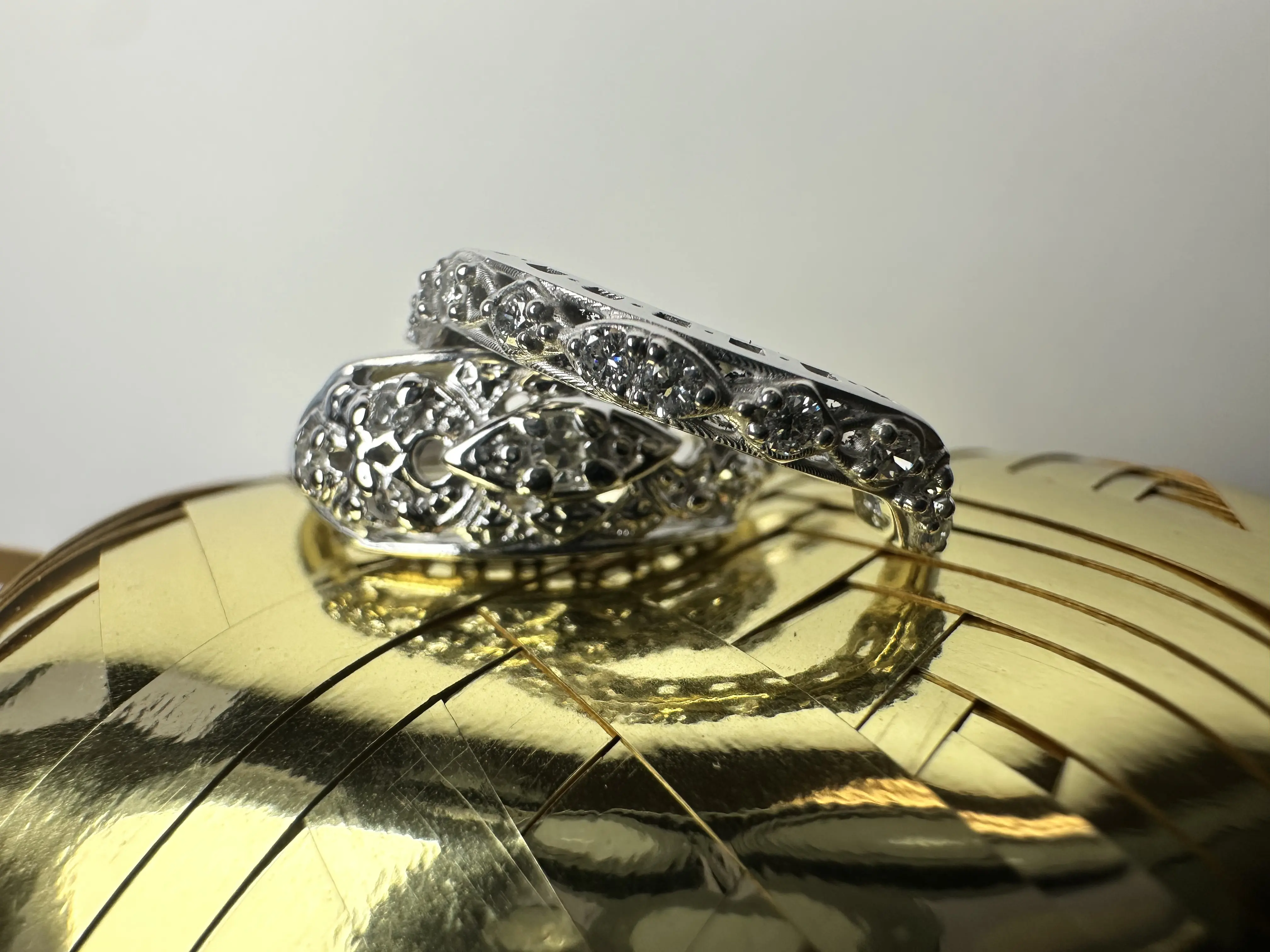 A stunning yellow diamond ring nestled within a circle of bright yellow flowers, symbolizing beauty and elegance.