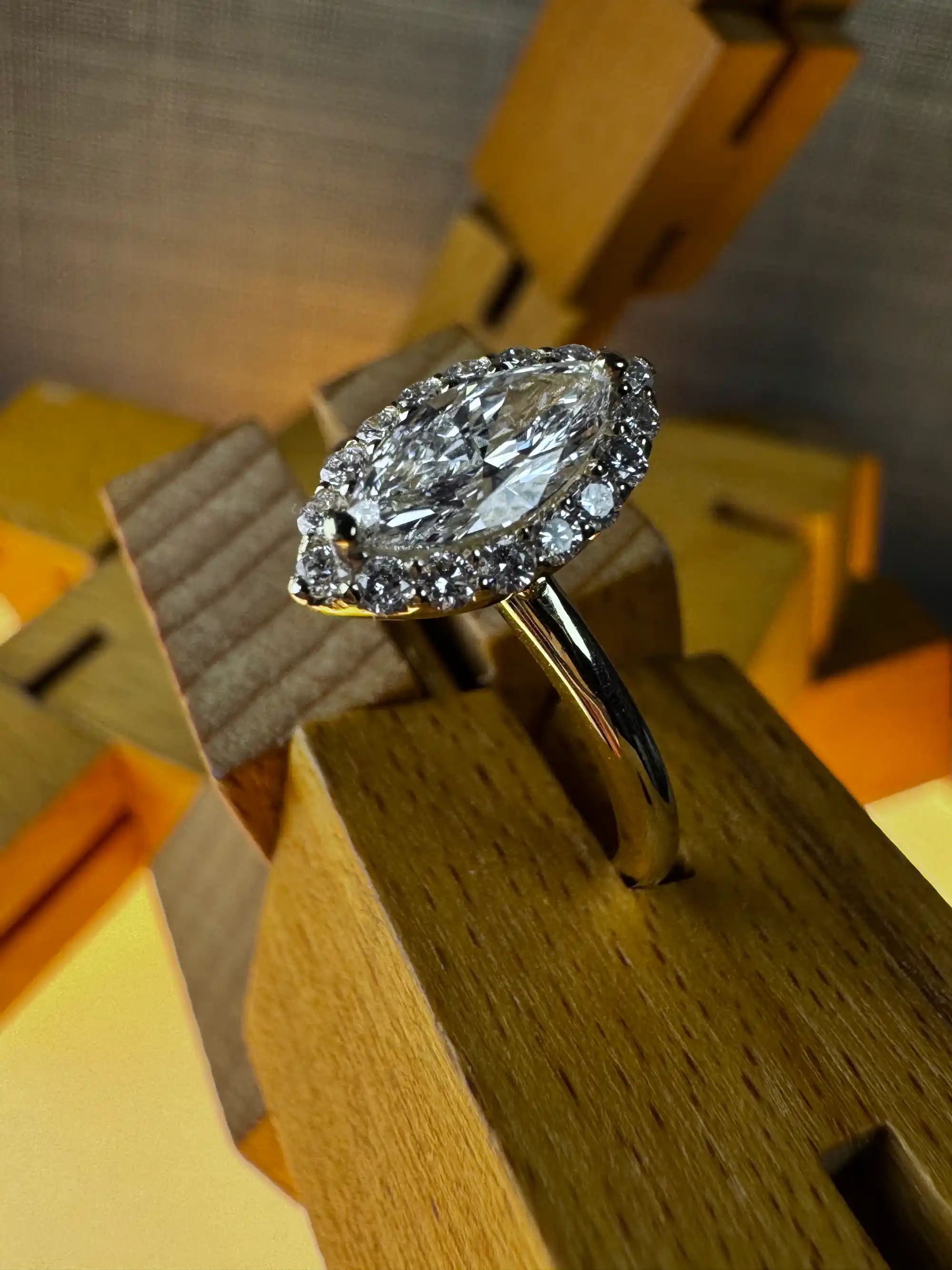A gold ring adorned with sparkling diamonds, showcasing elegance and luxury in its design.