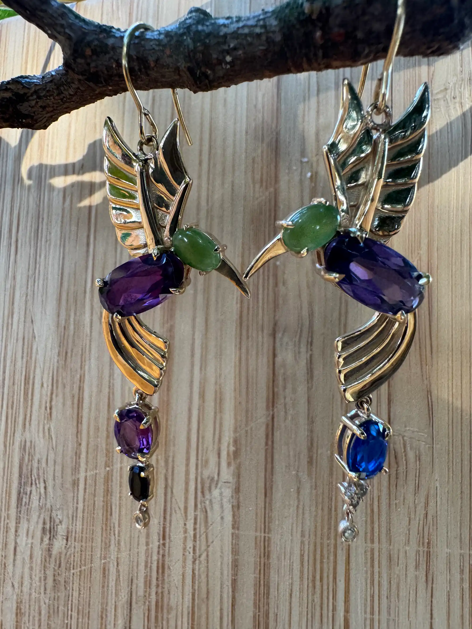 A gold ring adorned with sparkling diamonds, showcasing elegance and luxury in its design.