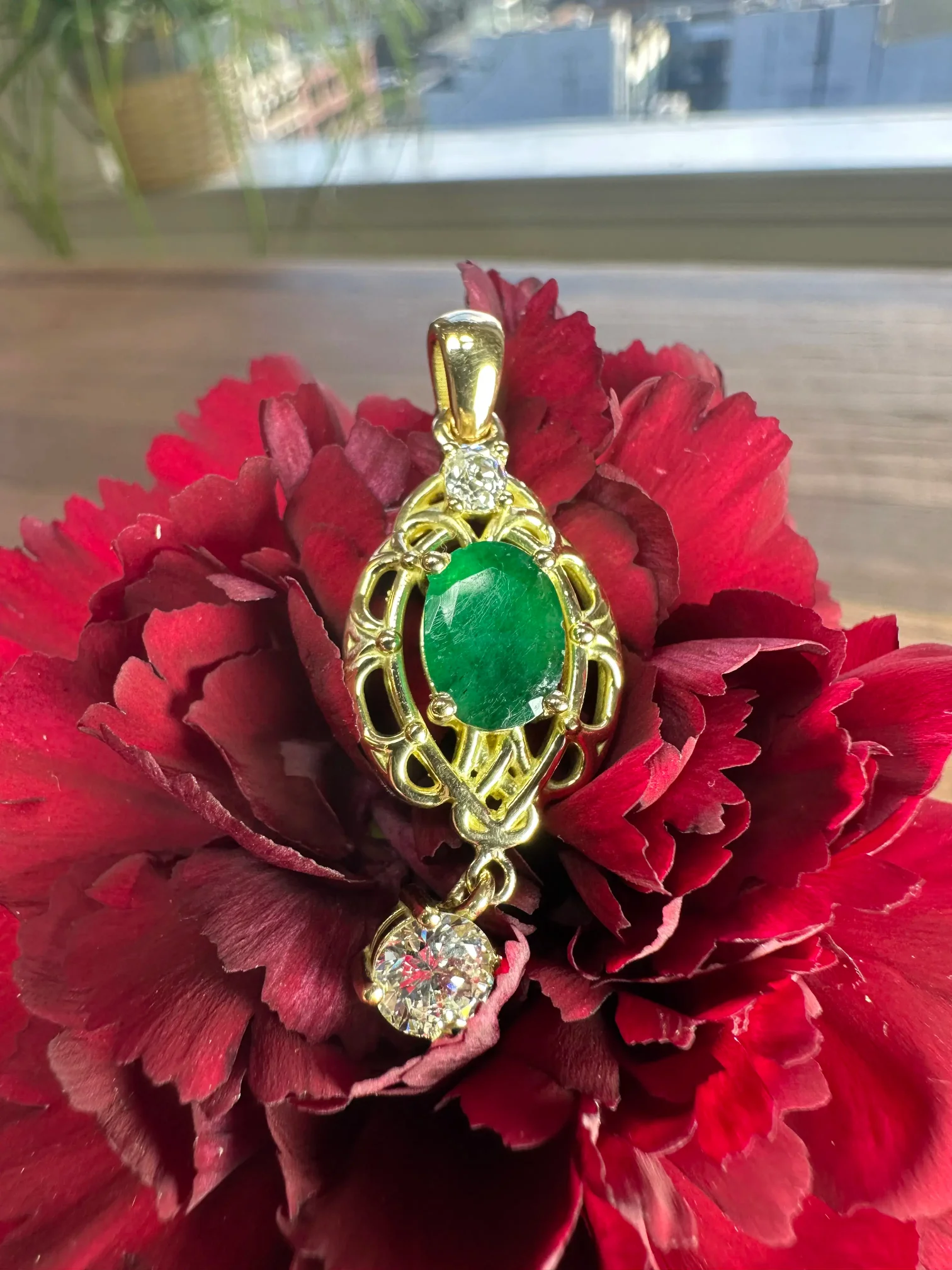 A stunning yellow diamond ring nestled within a circle of bright yellow flowers, symbolizing beauty and elegance.