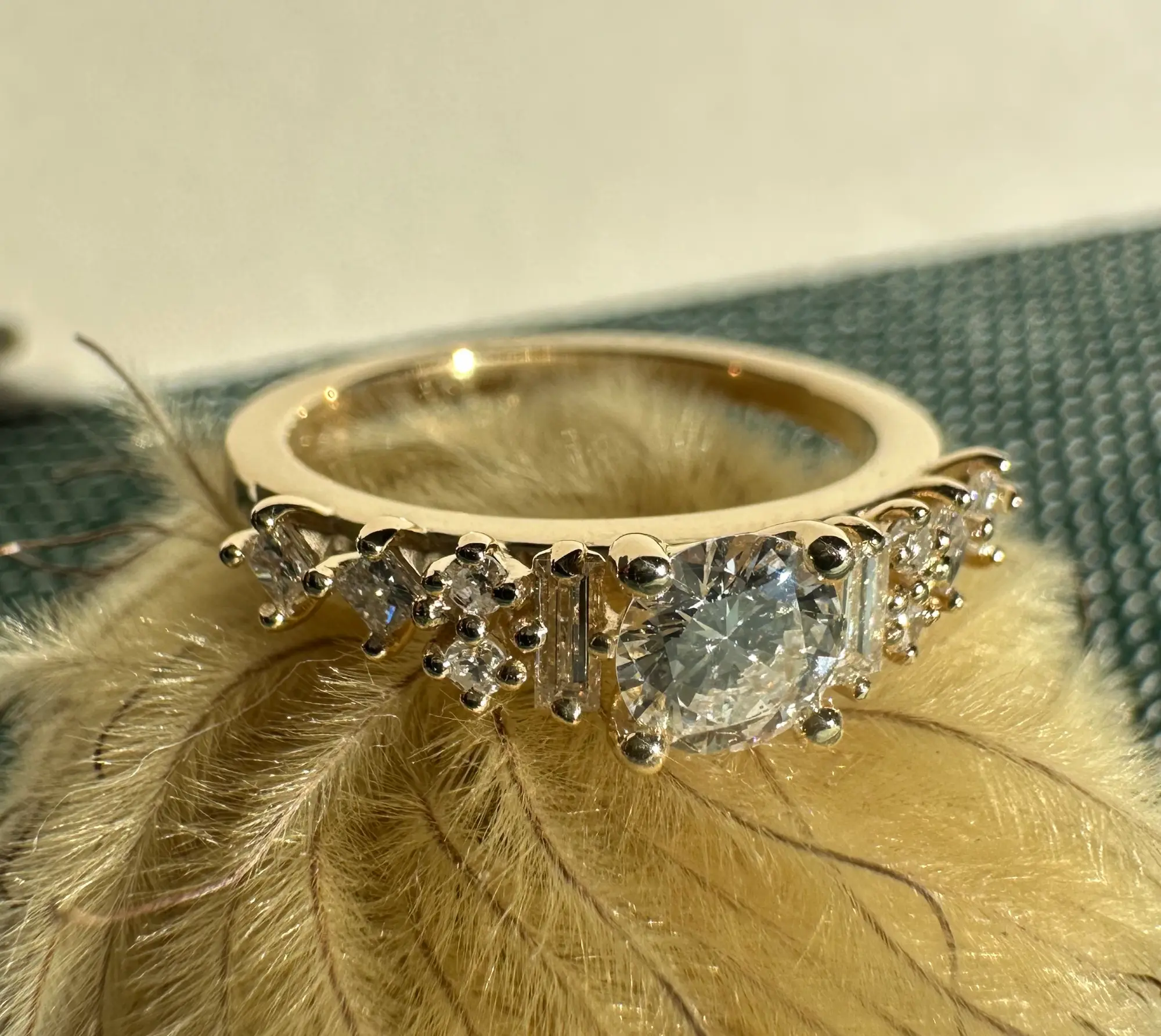 A stunning yellow diamond ring nestled within a circle of bright yellow flowers, symbolizing beauty and elegance.