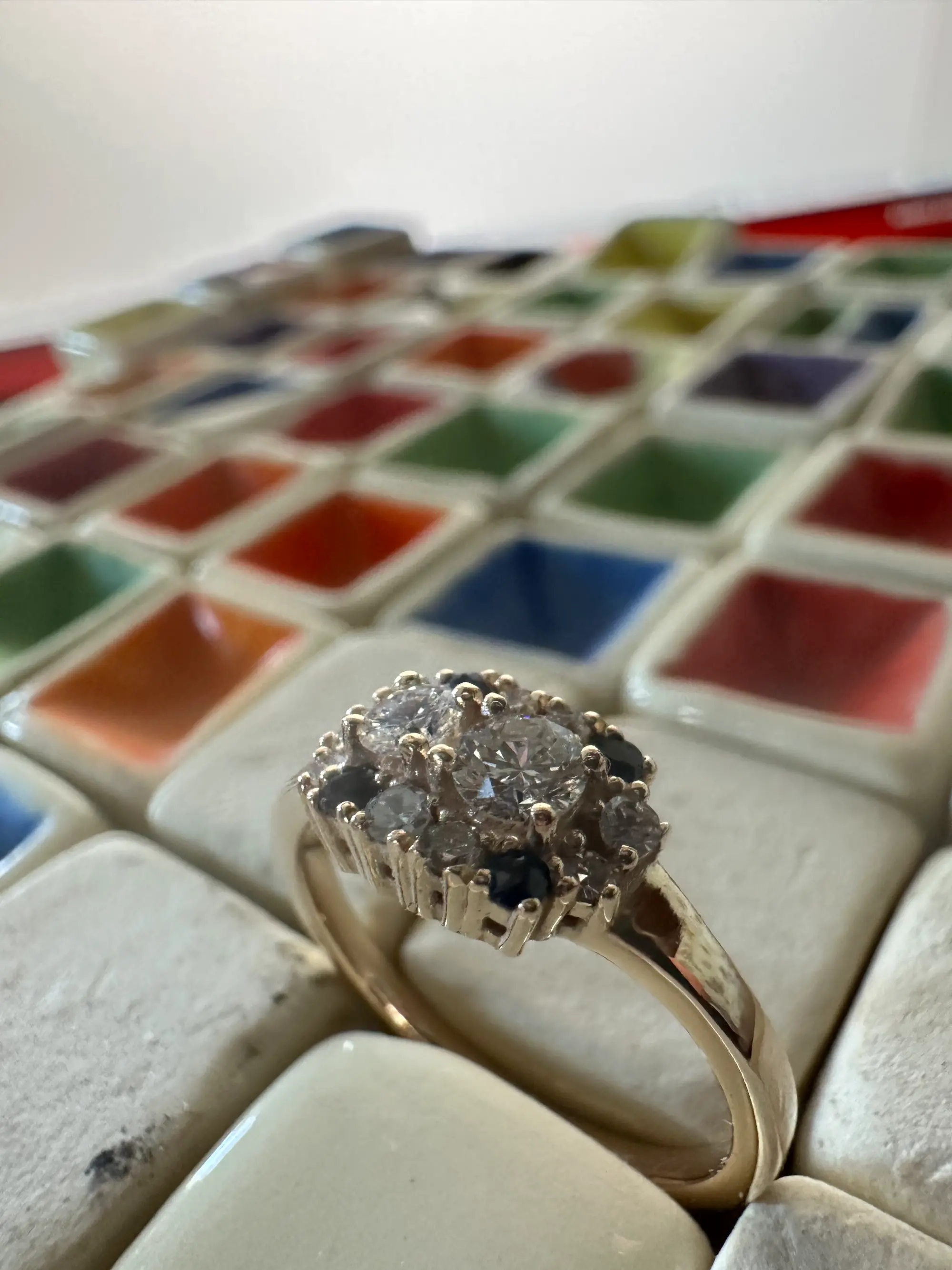 A stunning yellow diamond ring nestled within a circle of bright yellow flowers, symbolizing beauty and elegance.