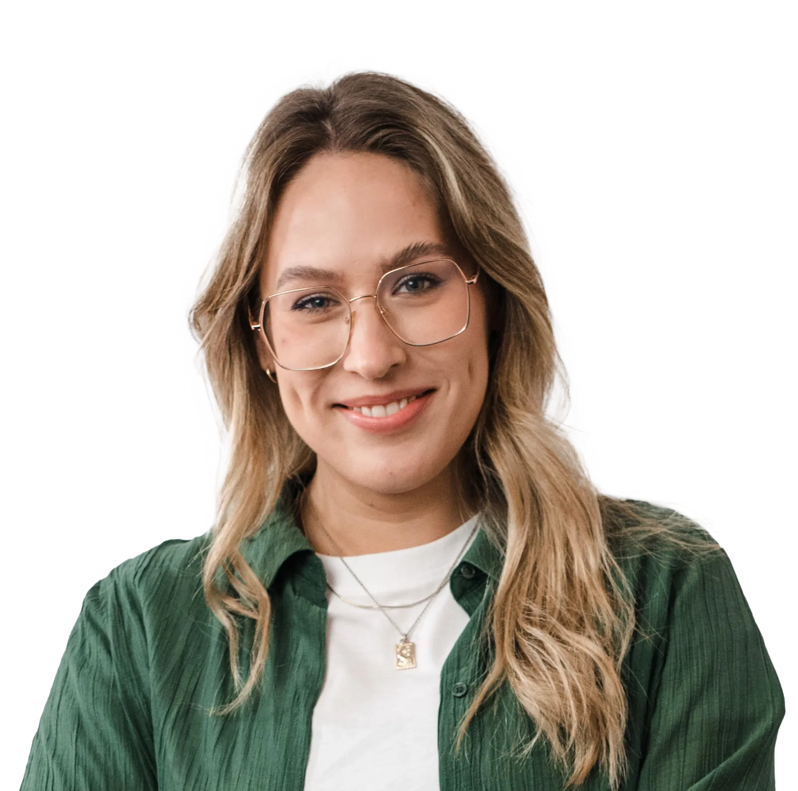 Portrait of a smiling woman wearing glasses, a green button-up shirt, and a pendant necklace against a white background.