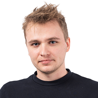 Headshot of a young man with blonde spiky hair wearing a black crew neck shirt against a white background.