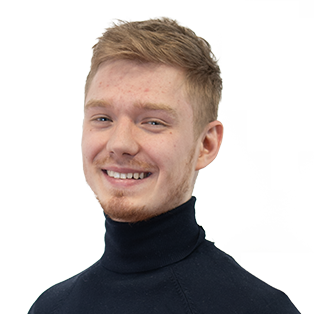 Portrait photograph of a smiling young man with light brown hair wearing a black turtleneck sweater against a white background.