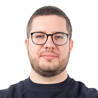 Headshot of a man with glasses and a dark shirt against a white background