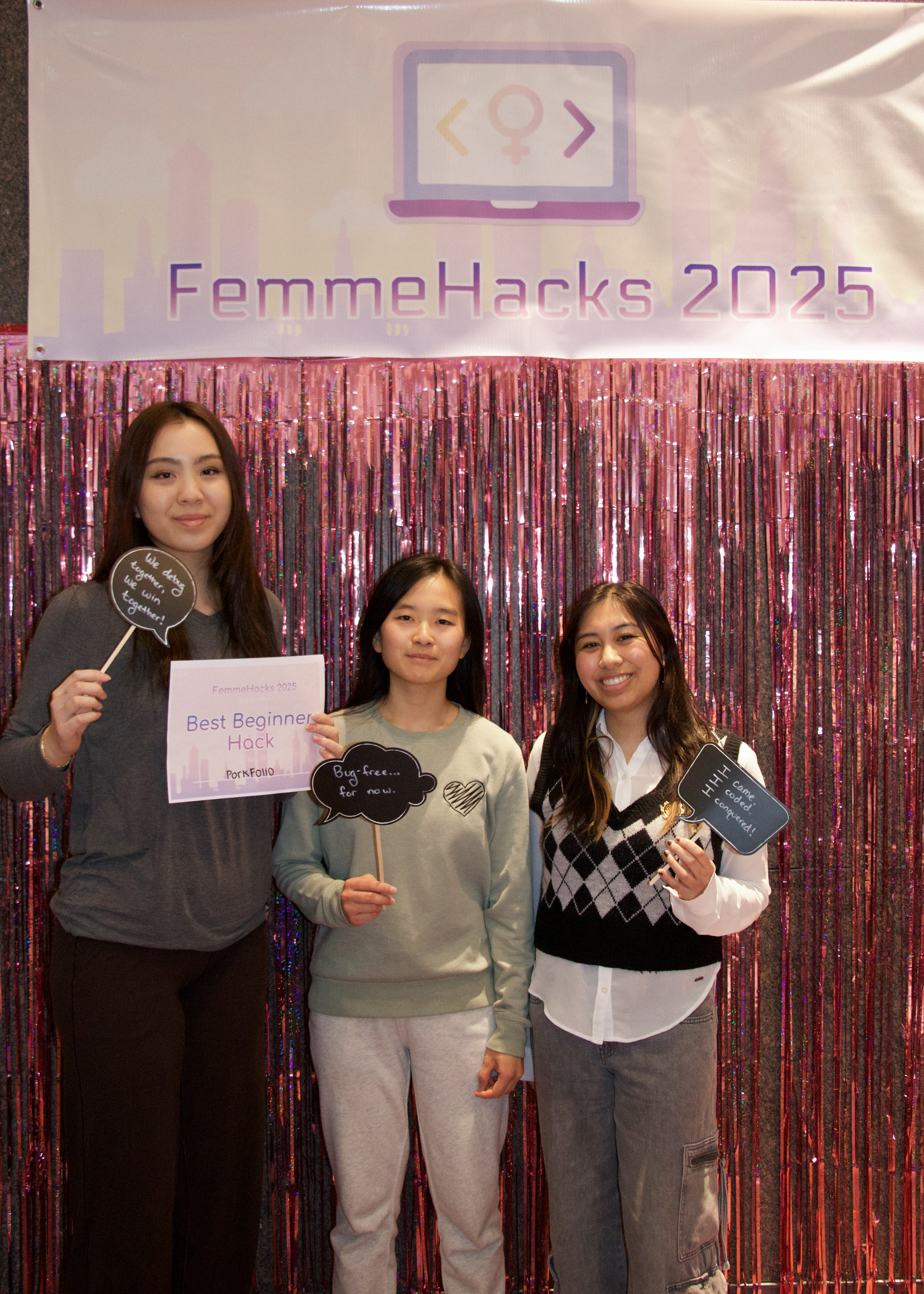 PorkFolio team accepting the winner award for Best Beginner Hack.