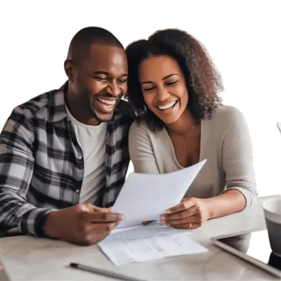 A young couple examining their financial documents as part of pre-purchase home buyer counseling.