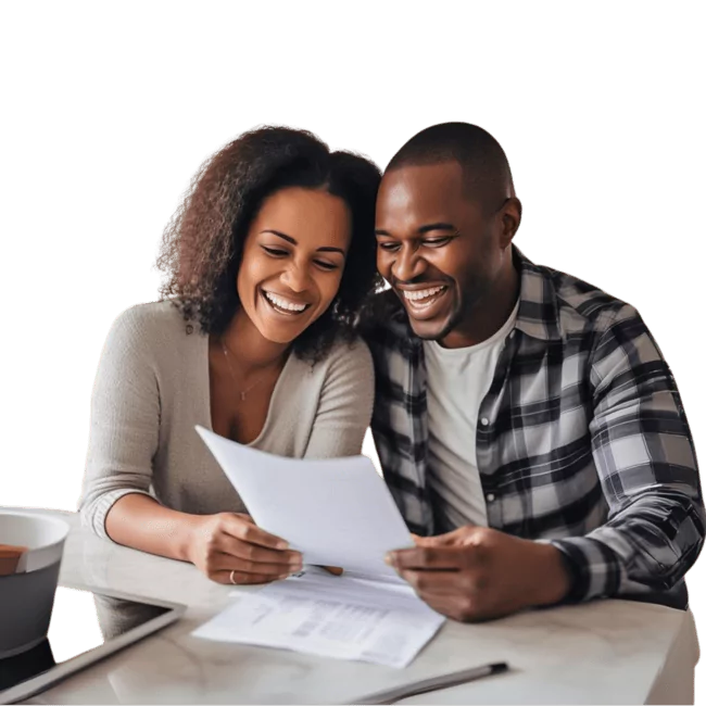 Couple reviewing mortgage loan documents together at home.