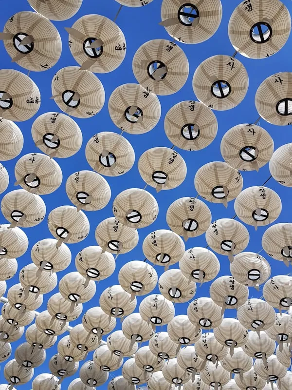 White lanterns during daytime.
