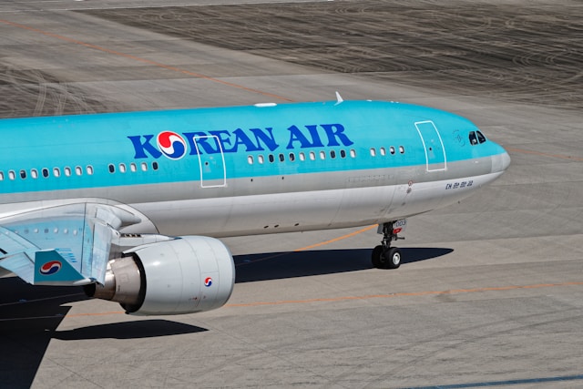A Korean Air passenger aircraft on a runway.