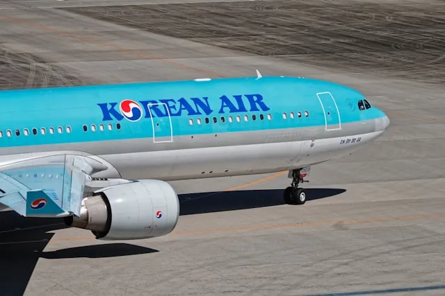 A Korean Air passenger aircraft on a runway.
