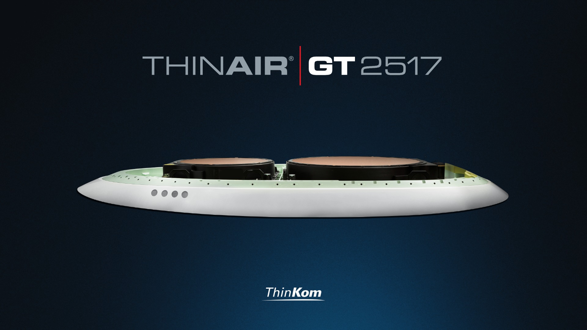 A ThinKom ThinAir® GT 2517 satcom antenna. The device features a low-profile, aerodynamic white base with two internal circular antenna discs visible on top. The product name "THINAIR® GT 2517" and ThinKom logo are displayed.