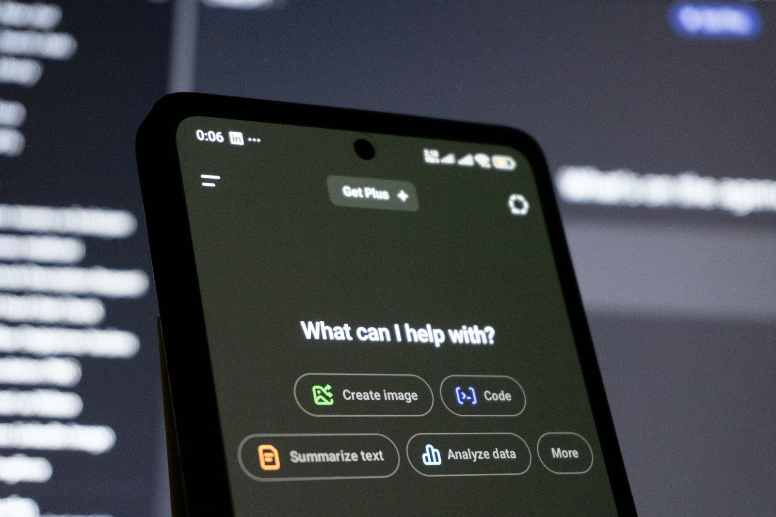 A smartphone screen displaying an AI chatbot conversation interface, illustrating the difference between chatbots and AI agents.
