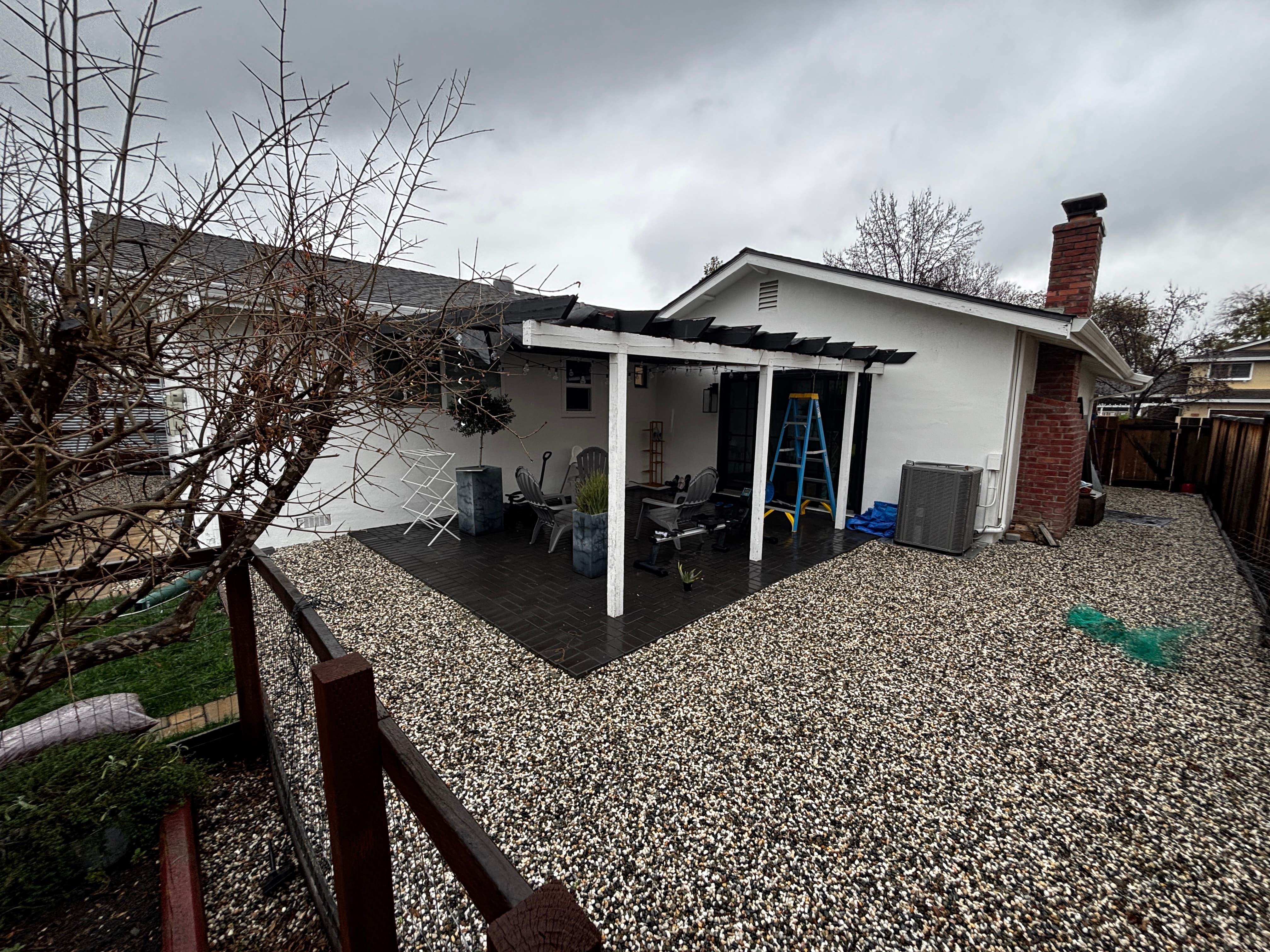 Current — Side yard and gate area