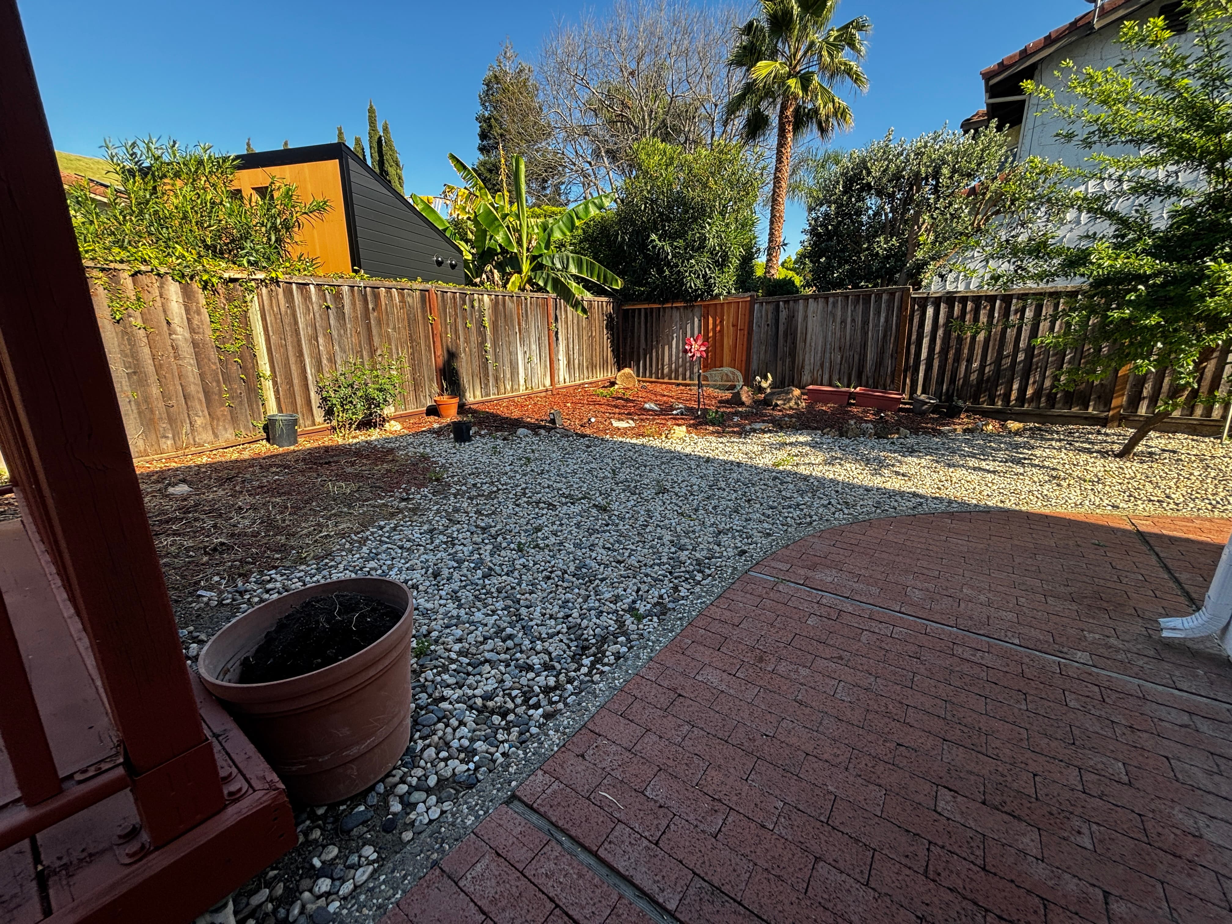 Current — Backyard post-deck removal