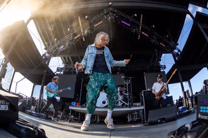 Picture of Matisyahu dancing on stage during his performance in 2019