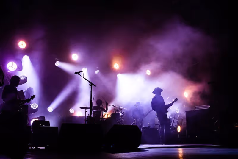 Blues phenom Gary Clark Jr. performing on a smokey stage