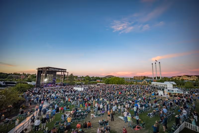 Picture of Hayden Homes Amphitheater at dust with light pink sunset sky