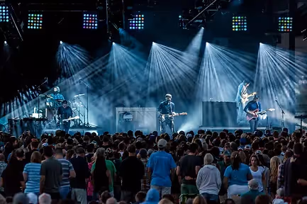 band performing with a cool light show