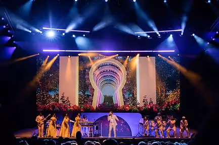 singer performing on keyhole stage