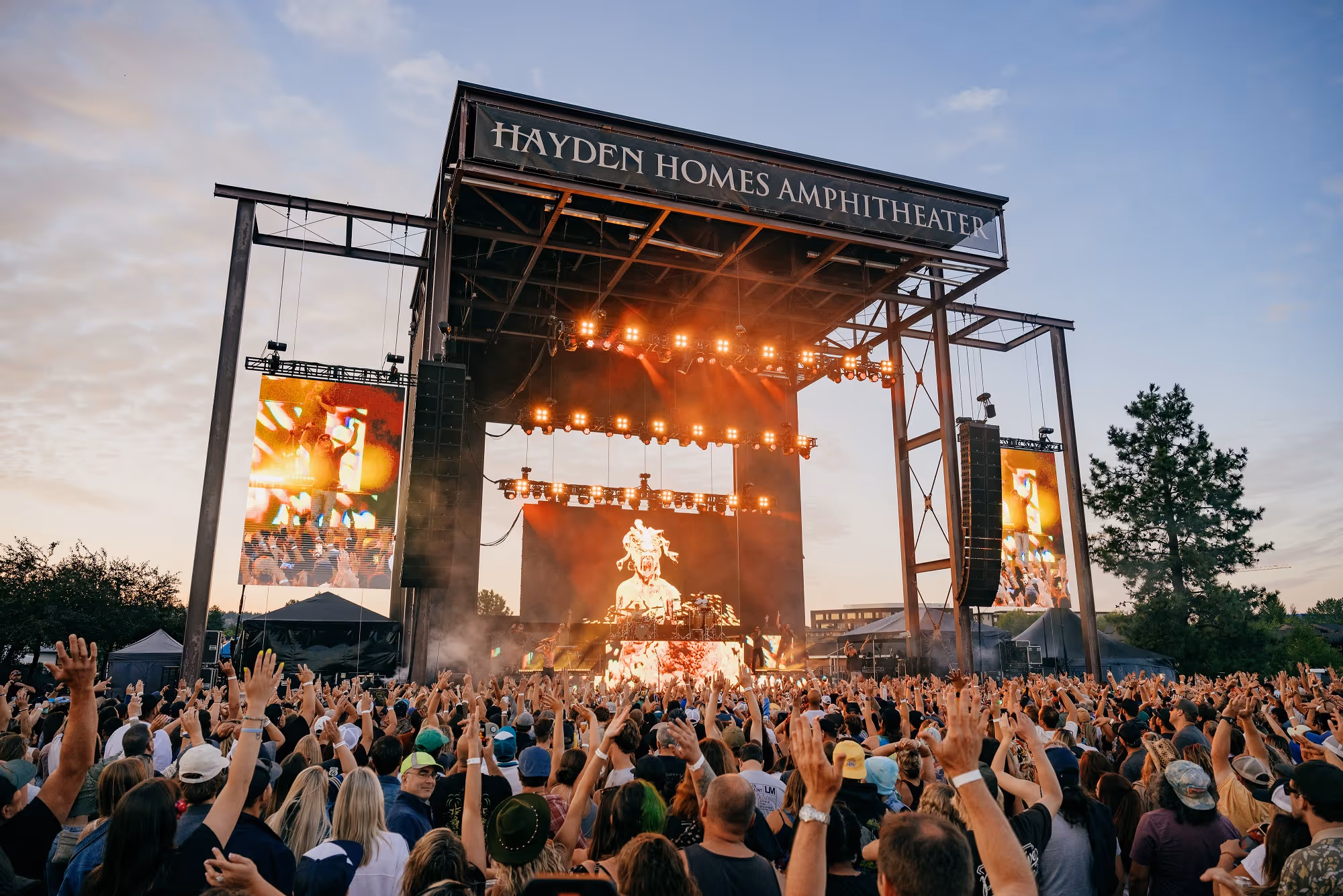Photo of crowd cheering at concert at Hayden Homes Amphitheater in Bend Oregon