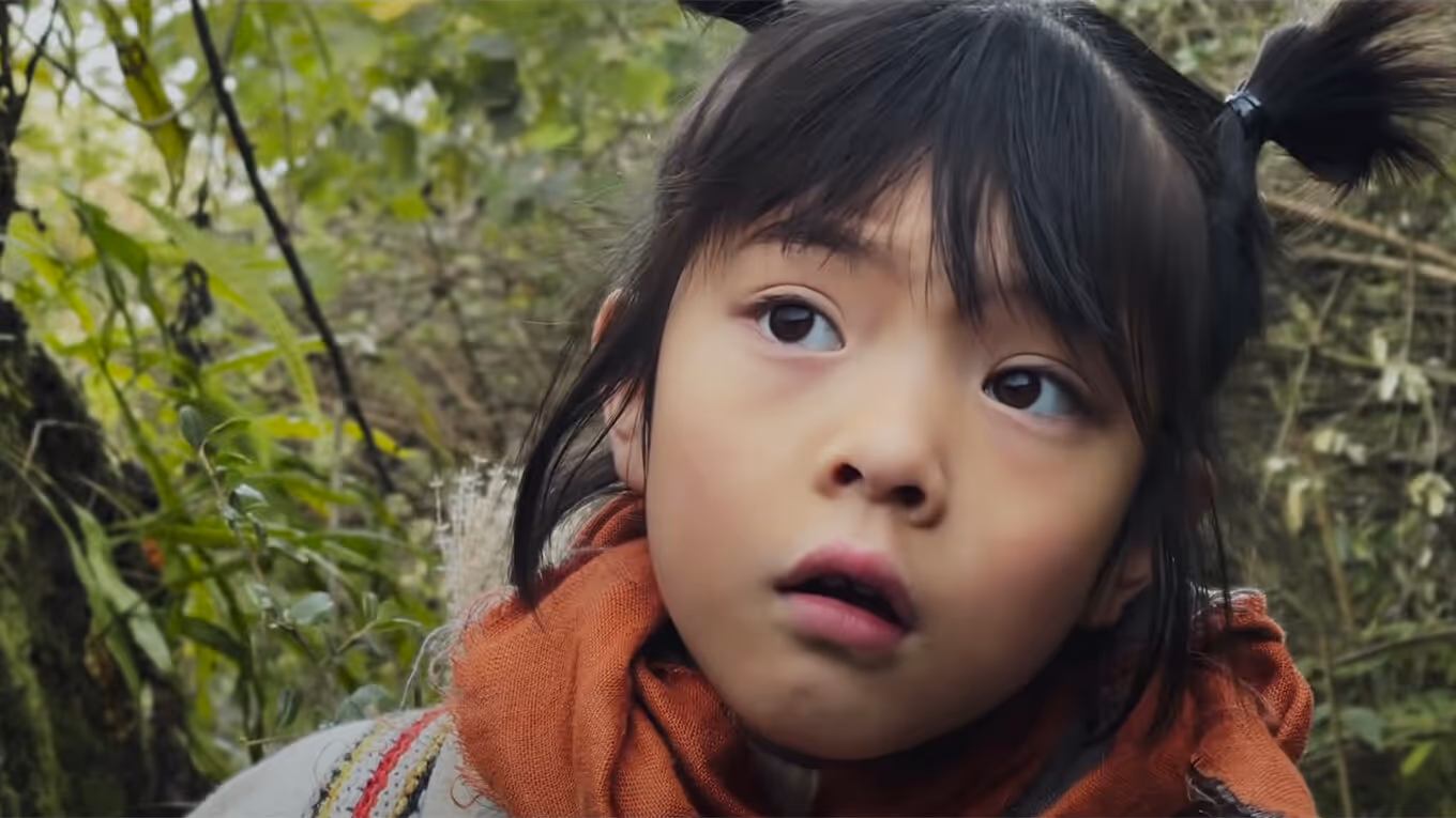A girl is seeing something